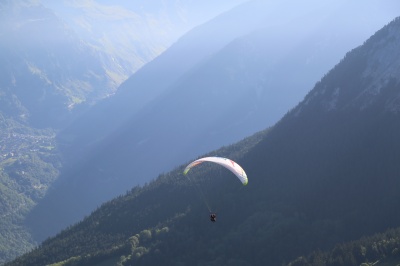 Paragliding first jump above La Tania, 3 Valleys, credit OT Courchevel